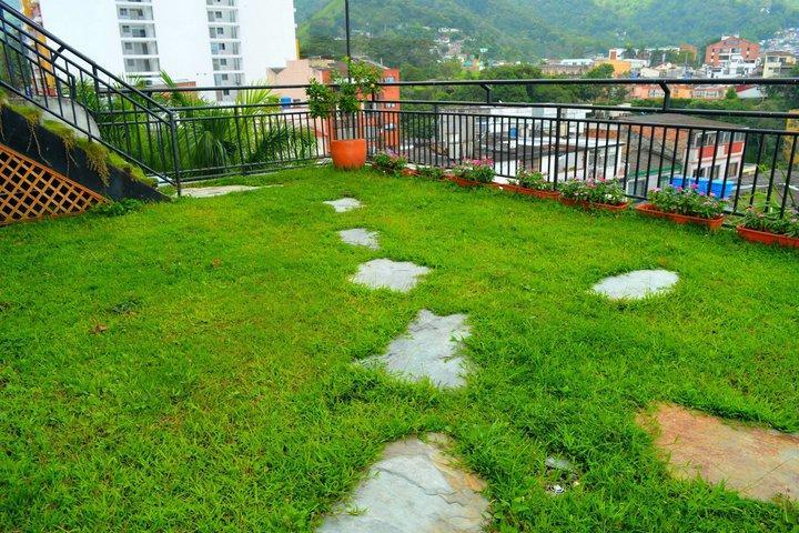 Casa Morales Hotel Internacional Y Centro De Convenciones Ibague Luaran gambar A rooftop garden in Kathmandu, Nepal